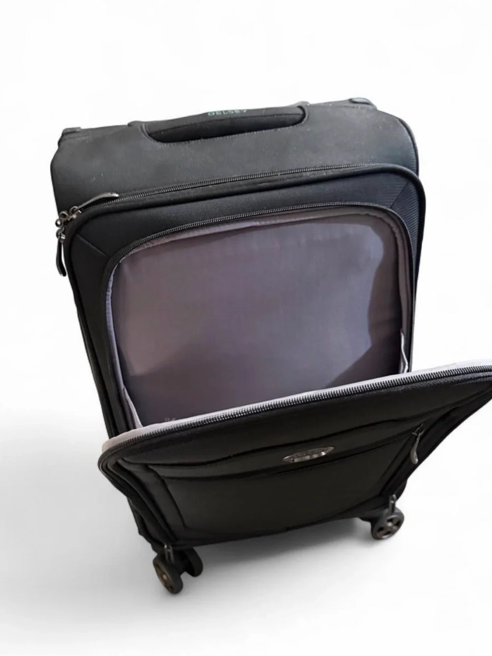 Delsey Paris Black soft-side Carry-On Spinner luggage 22”